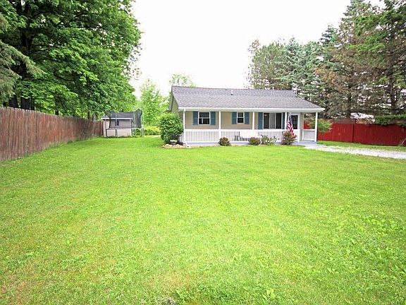 The lot is fenced on both sides and in the back. The lot is 80x242.