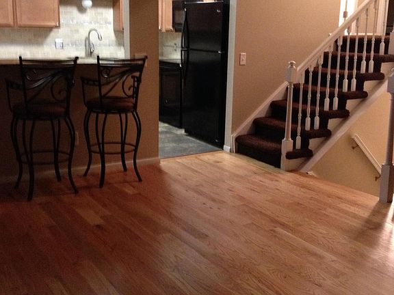 Open-concept main level with real hardwood floors