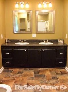 Master Bath
						:
						Completely remodeled. Combination tub/shower unit. Fixtures are brushed nickel.