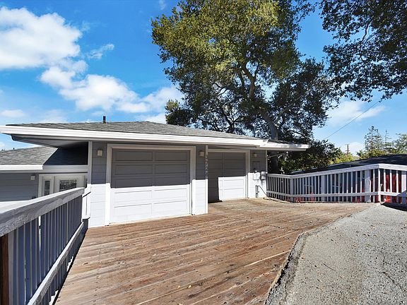 Driveway, two car garage.