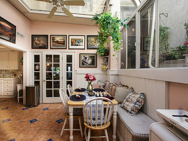 Another view of the skylit atrium adjacent to the kitchen. The breakfast nook is a wonderful amenity.