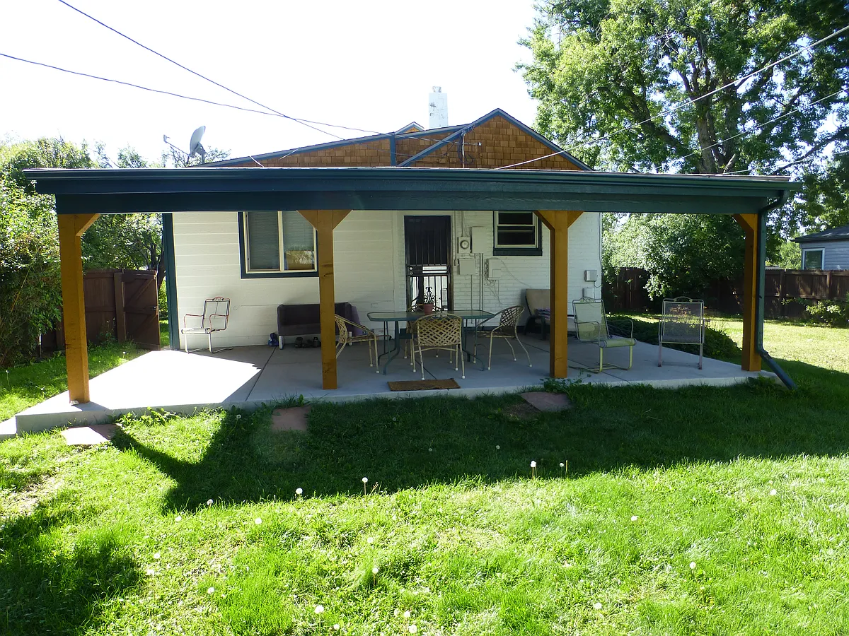 Back of house showing large covered patio. - 2580 S Race St