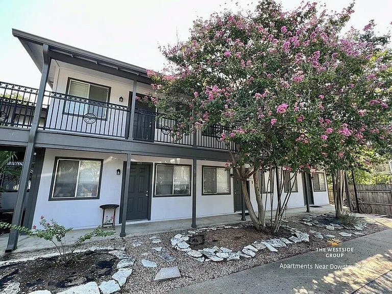 apartment building facing parking