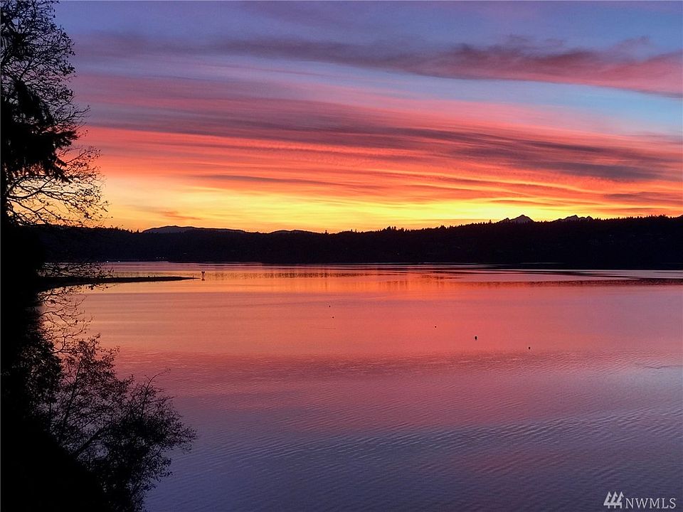 Beautiful sunset views behind the Olympic Mountains is accentuated by the beautiful water front vistas looking at Port Orchard Narrows.     