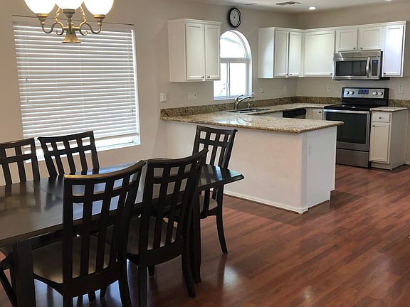 Dining room opens into updated kitchen
