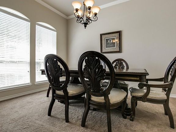 Formal dining at entry could double as study