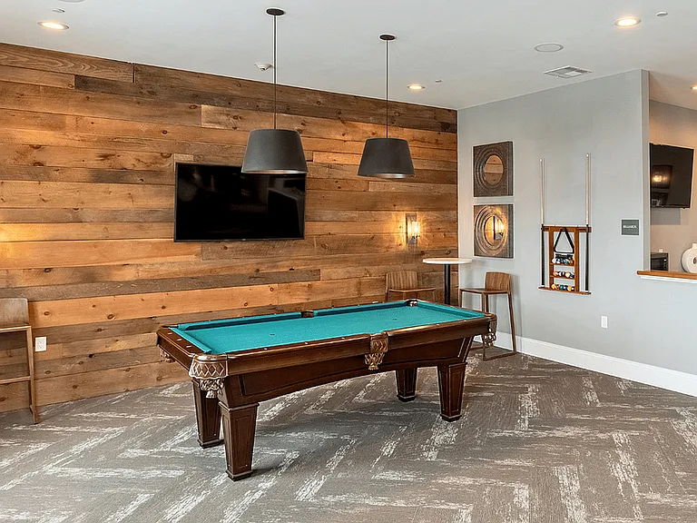 Our clubhouse offers a fun and vibrant space with a billiards table and a variety of games, perfect for relaxing and socializing with friends and neighbors.