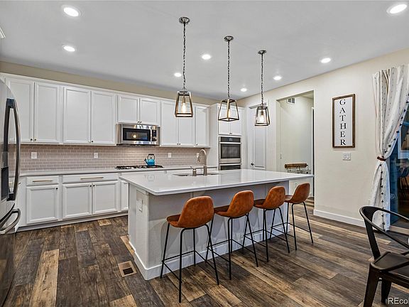 4th image of 10034 E 59th Ave