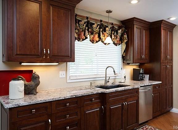 Cherry Kitchen to die for! Granite counters and hickory floors.