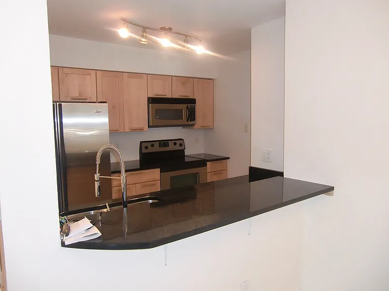 2881 N Oakland Forest Dr #112 — Photo 9
