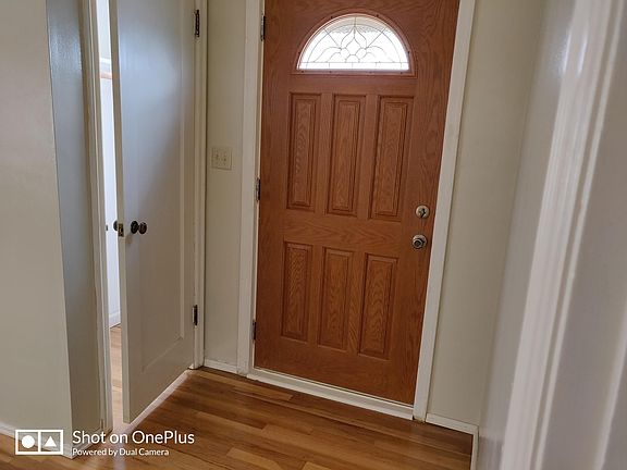 Front door and coat closet