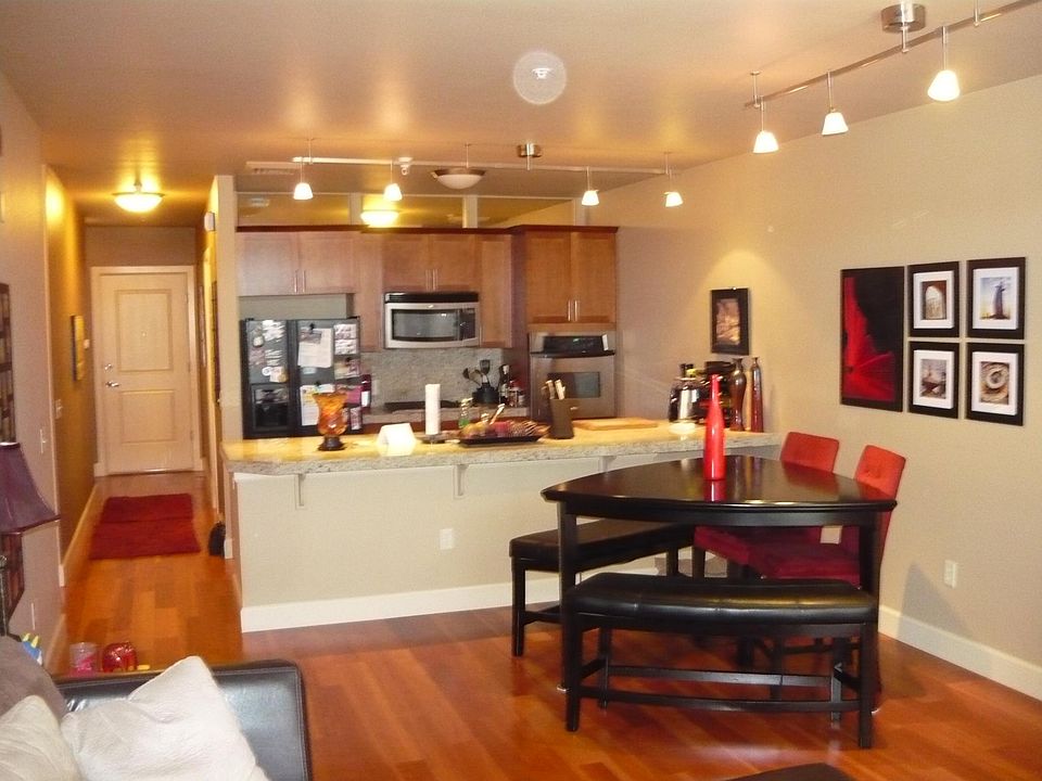 Living area with kitchen in background