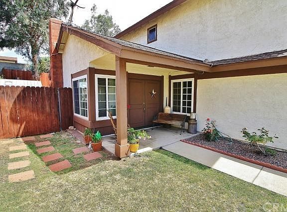 Charming covered porch entryway