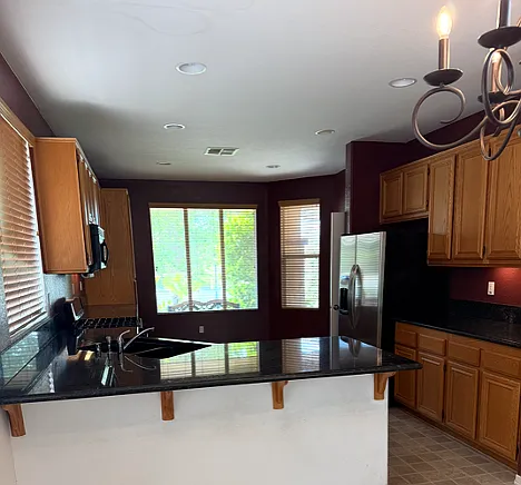 Kitchen. Better pics coming soon, as the flooring has been replaced since this picture was taken.