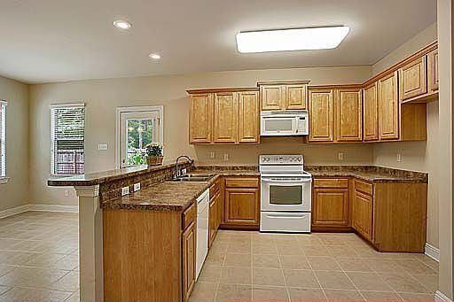 Plenty of counter space and cabinetry in Kitchen.