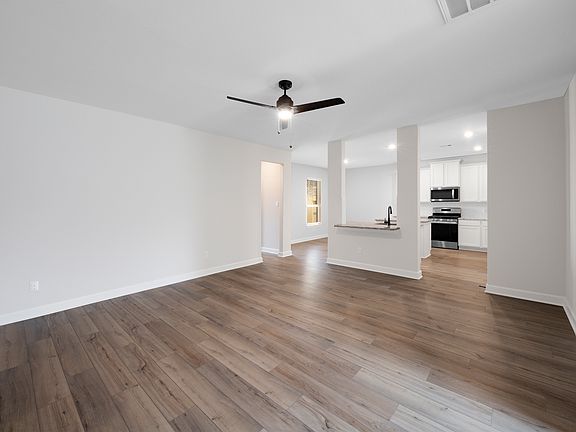 The spacious family room is the perfect space for sports watch parties and family movie nights!