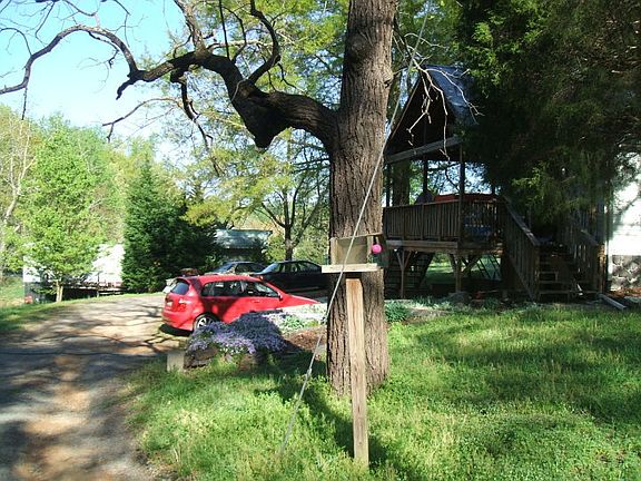 Side porch, covered parking.