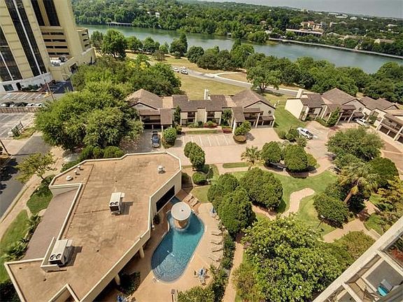 View of the pool and garden area from balcony