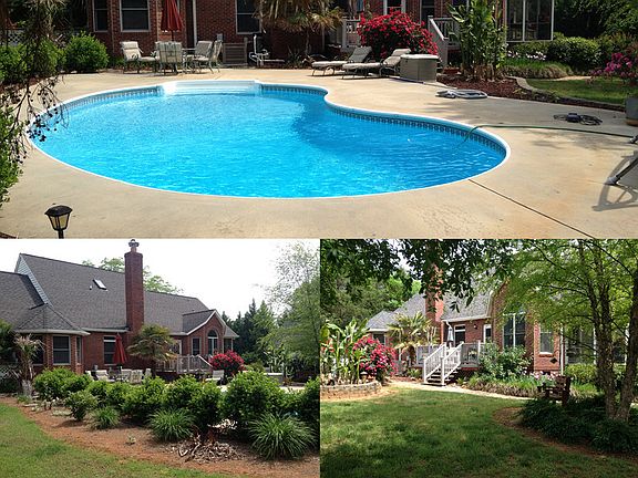 Backyard and Pool
						:
						The backyard in-ground pool oasis complete with mature palm trees and patio area