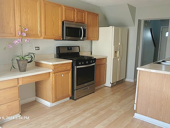Bright Kitchen with stainless steel appliances