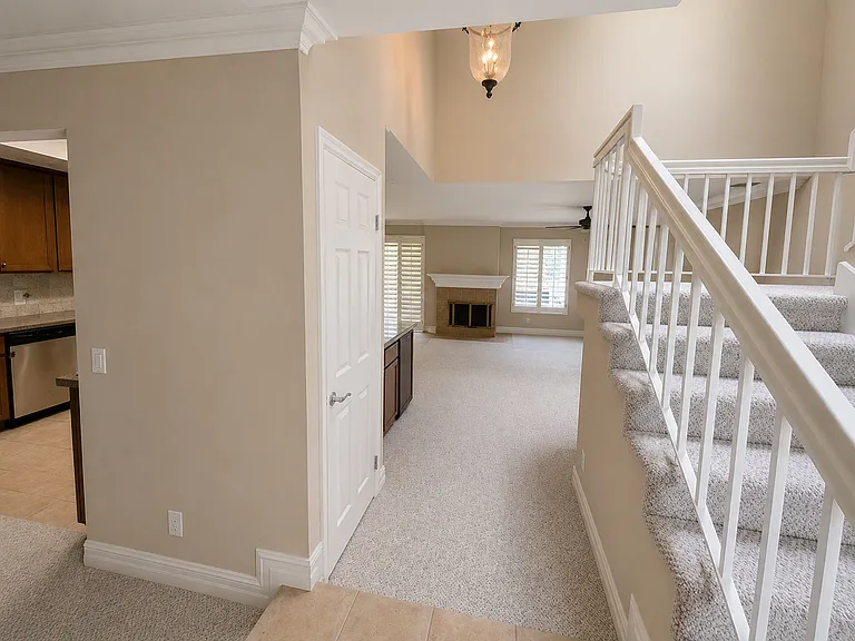 Entrance to home. Directly leads to the living room with kitchen and family room on left.