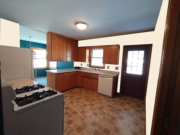 Computer rendering of the kitchen. We are currently painting, and this will be done before move-in.