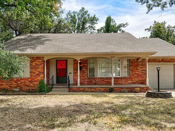 Front house with beautiful red door.