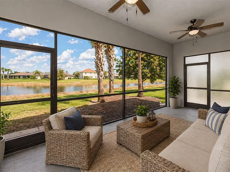 Comfortable screened in pation overlooking pond