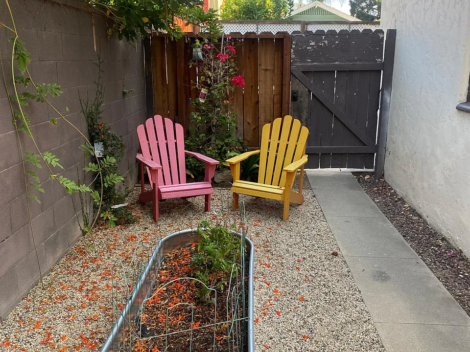 Shared yard with multiple sitting areas