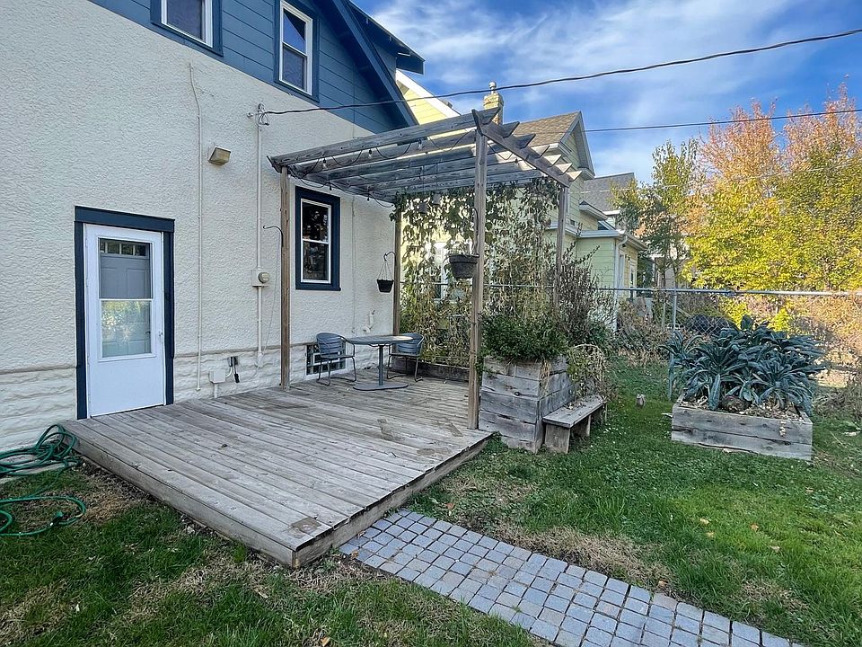 Back yard: deck off kitchen and raised beds