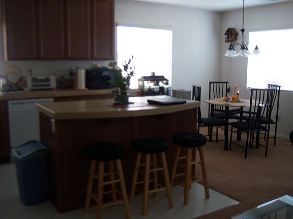 Kitchen features an island.