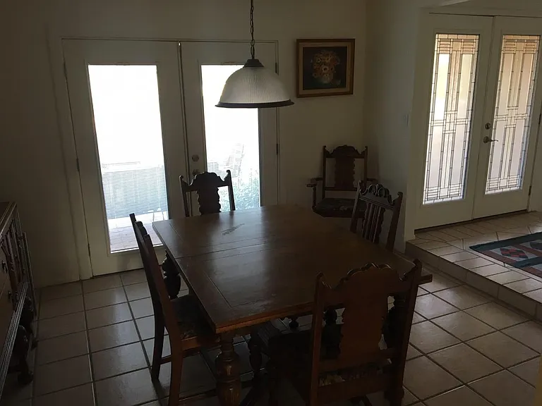 Dining Room with French Doors to the Entry Patio
Please excuse the lousy picture