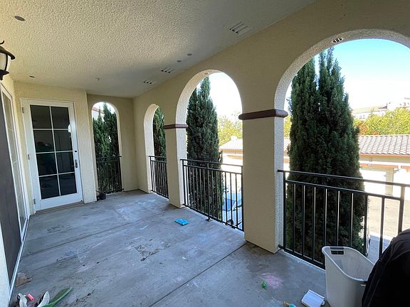 Patio facing parking and mountain