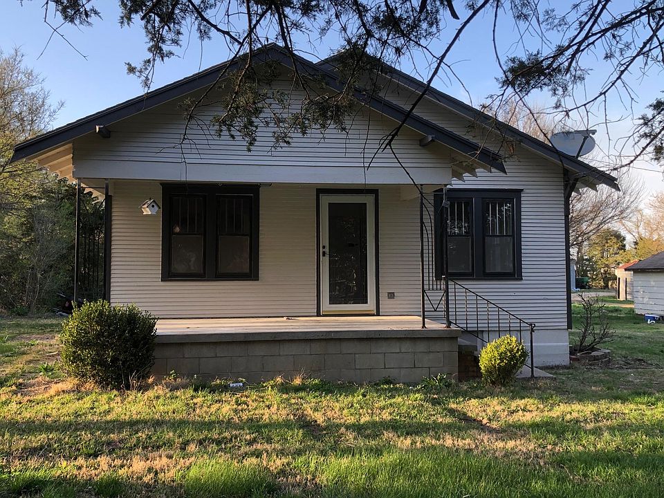 It just needs the porch swing (the hooks are there)