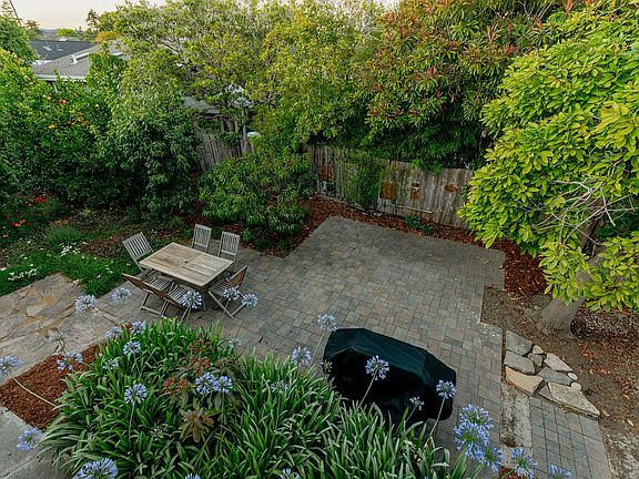 Peaceful garden BBQ area in back