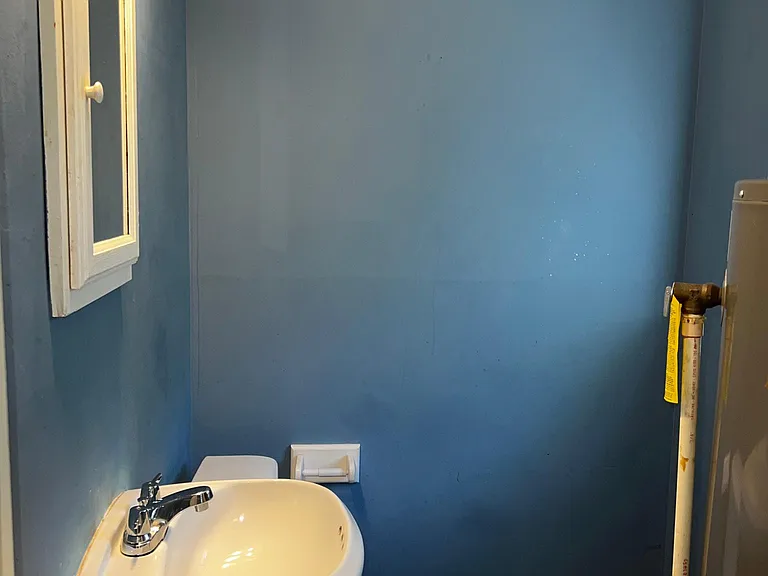 Half bath located on west side of house.