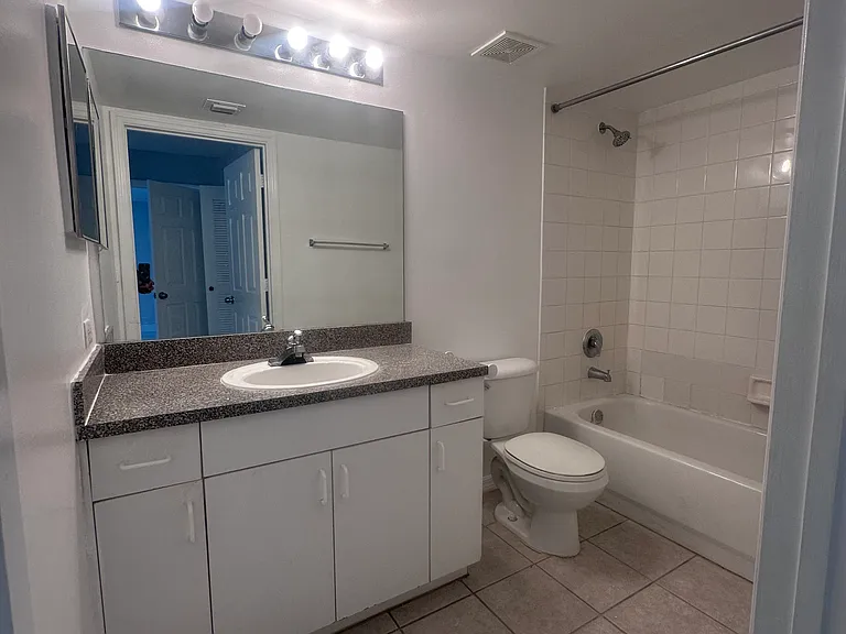 5011 Wiles Rd #207 — Photo 22