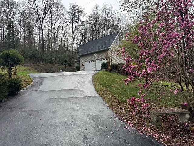 Paved driveway. Note all roads that lead to this house are paved.