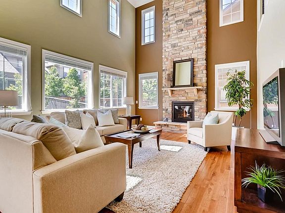 stacked stone 2 story gas fireplace