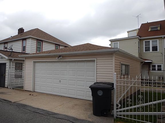 2 car garage between front house and rear house.