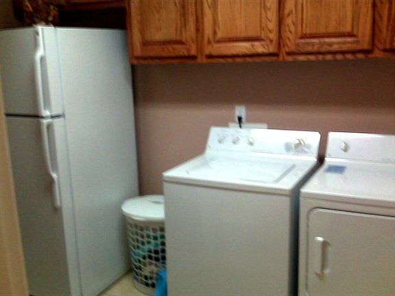 Laundry room to the right of the foyer