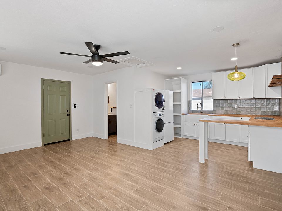 Freshly renovated private detached guest house with new kitchen, new bathroom, new wood-look tile flooring throughout, new lighting, new ceiling fan, etc.!