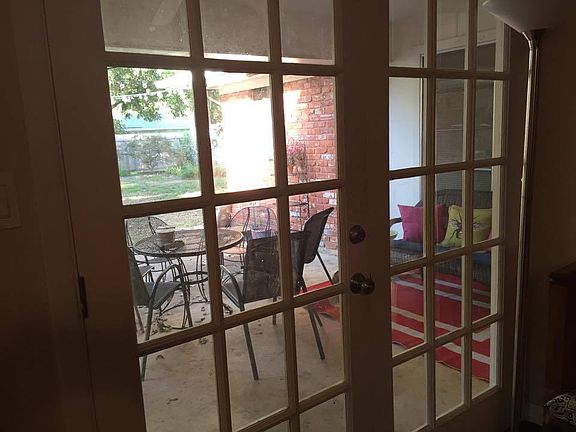 Patio with ceiling fan. 