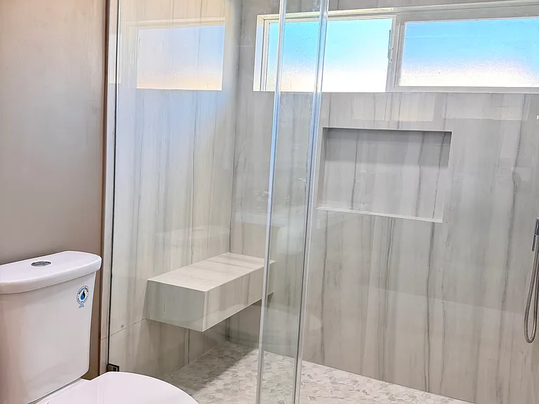 Bedroom 1 Private Bath - Standing shower with built in bench.