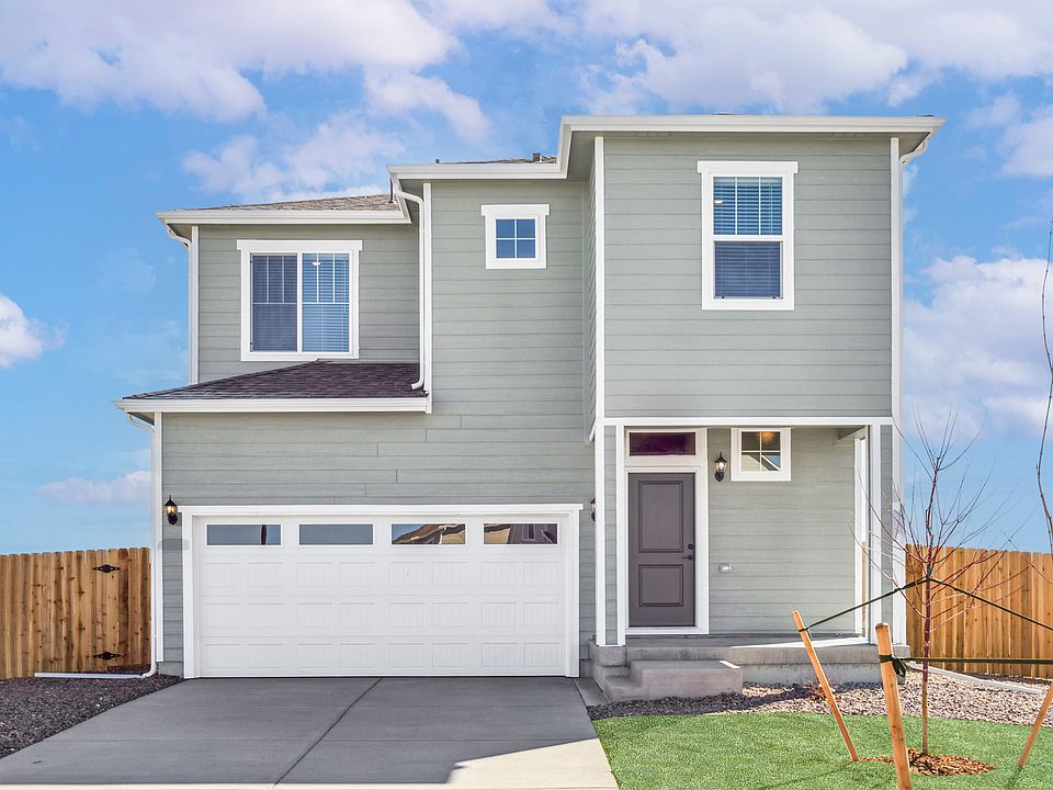 The Ridge is a beautiful two story home with siding.