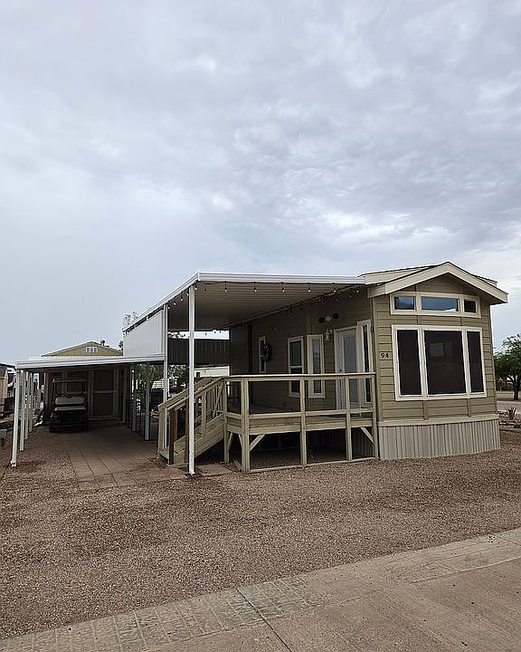 Front of home, deck/carport
