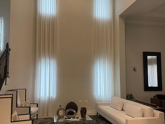 Main elegant living room with Restoration Hardware furniture