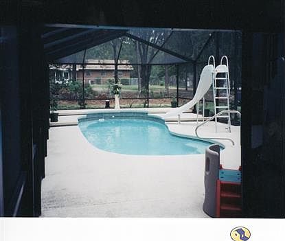 Screened-in Pool, Slide, Waterfall, & Jets