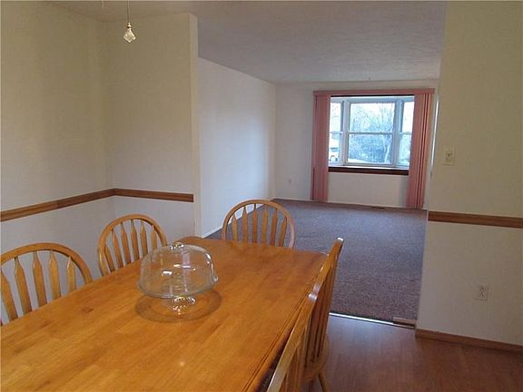 Chair Rail and Ceiling Fan give a finished look to the dining area.