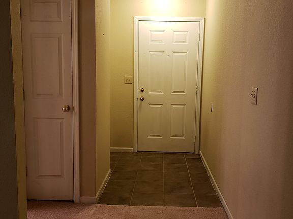 Entry door showing coat closet.
